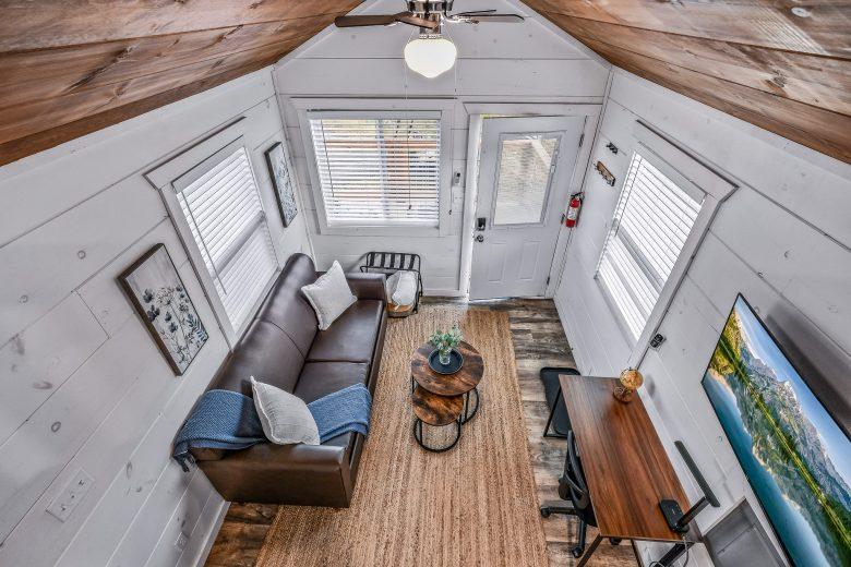 Overhead view of living room and front door in tiny home